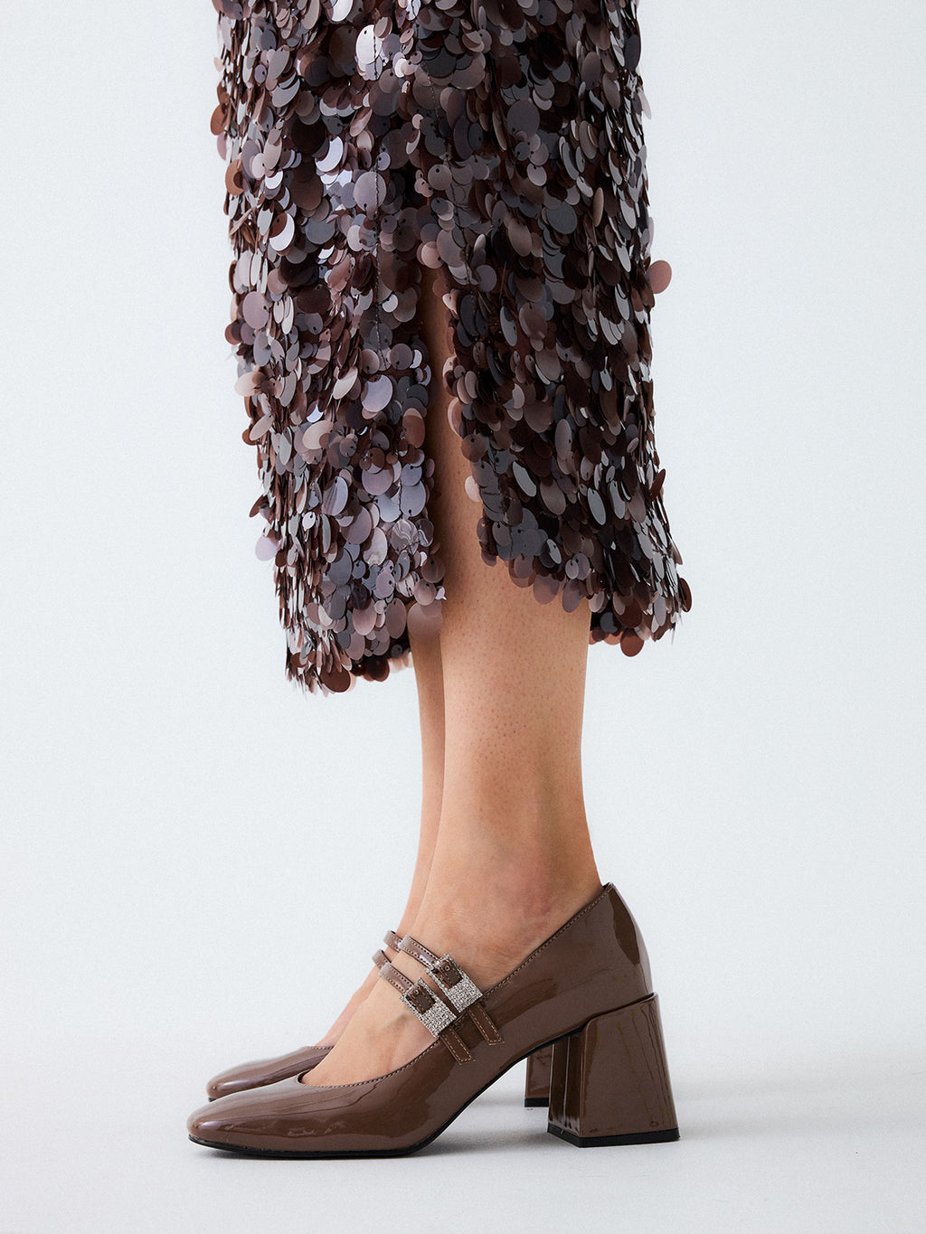 REMINI-611 PATENT BROWN