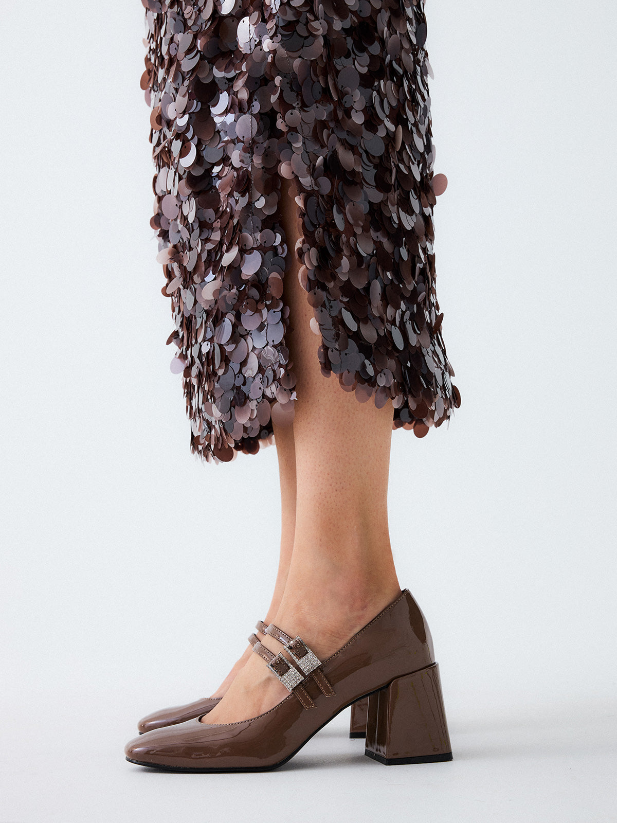 REMINI-611 PATENT BROWN